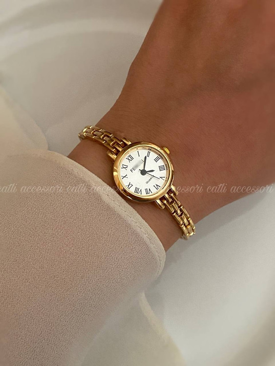 ساعت طلایی رنگ ثابت