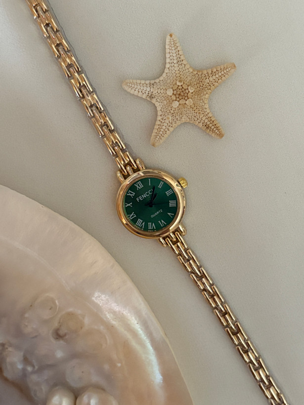 ساعت فنسی طلایی سبز